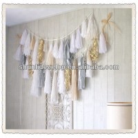 Holiday Must-Makes: Haning Tissue Paper Tassels garland